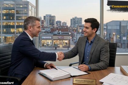 Commercial lease handshake in a modern office.