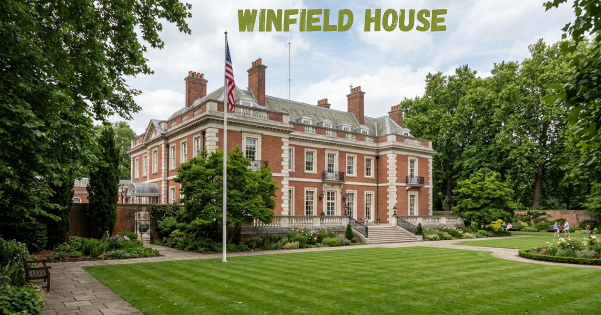 Winfield House, a grand red-brick London residence surrounded by landscaped gardens and mature trees, with a US flag displayed in front.