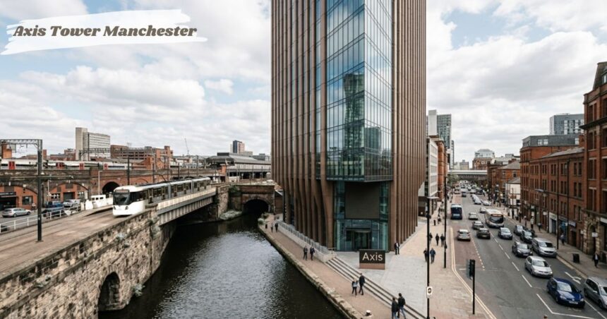 Axis Tower Manchester beside the canal and tram tracks, with city streets and historic brick buildings